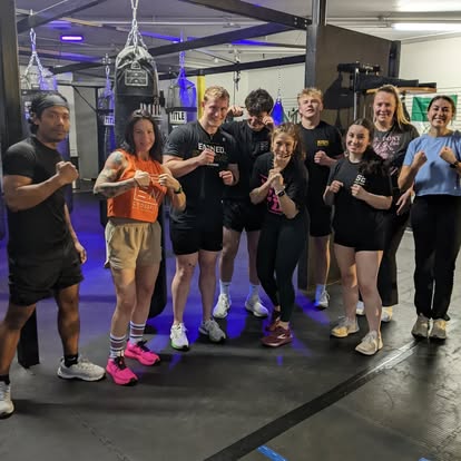 A BOX STL class smiling together after training